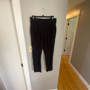 Black high waisted straight leg pleated pant